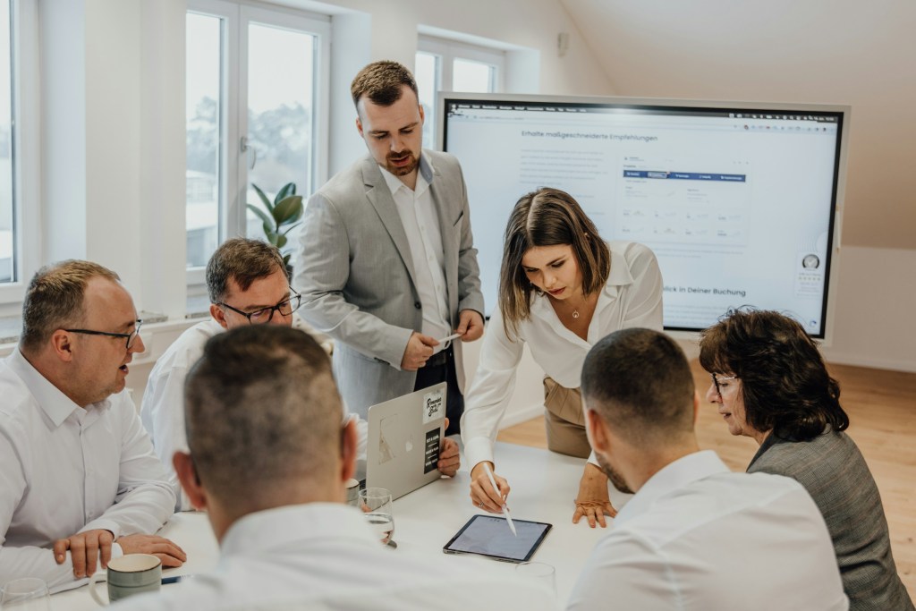 Group of business professionals in boardroom